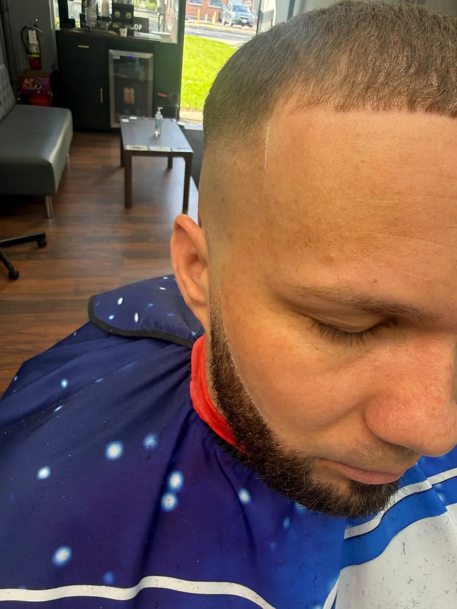 Crisp skin fade haircut, close-up detail